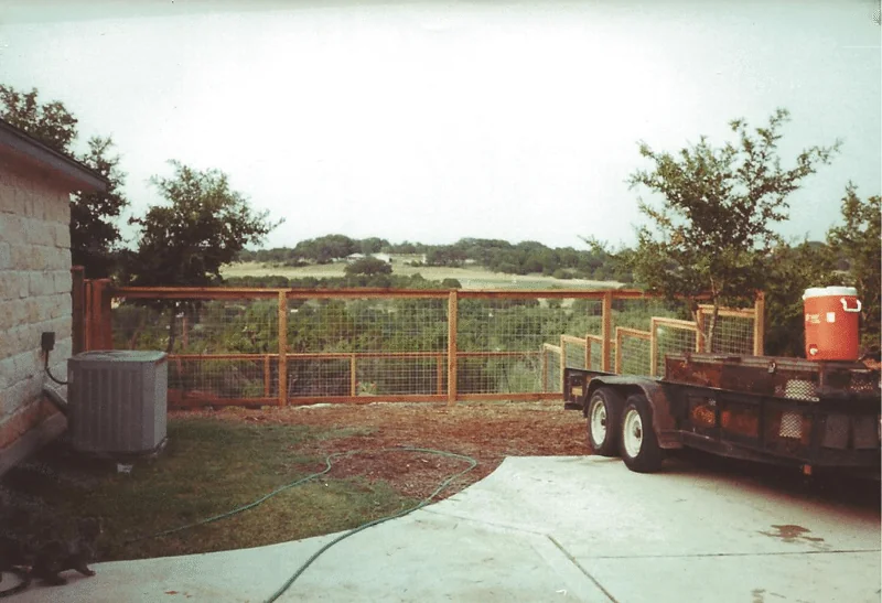 Decorative cattle panel fence and gate installed by B.C. Fence, Cedar Park, TX
