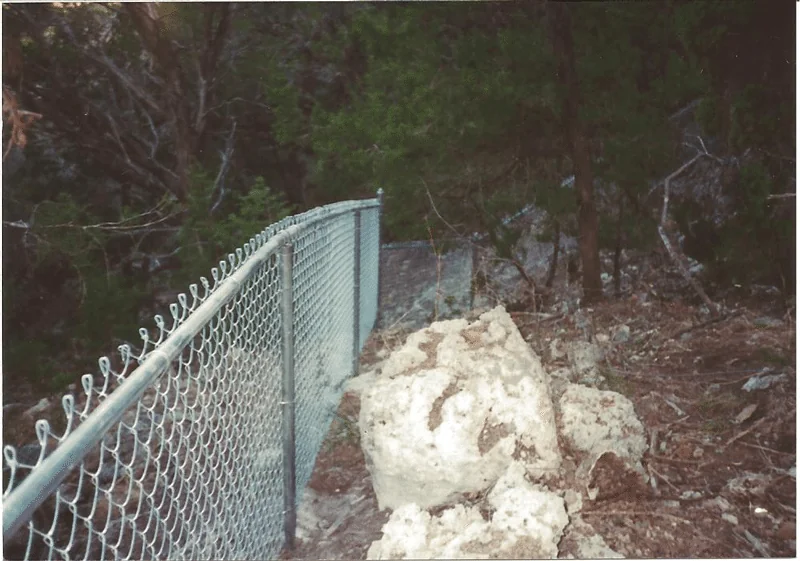 Chain link fence line completed by B.C. Fence on an Austin-area property