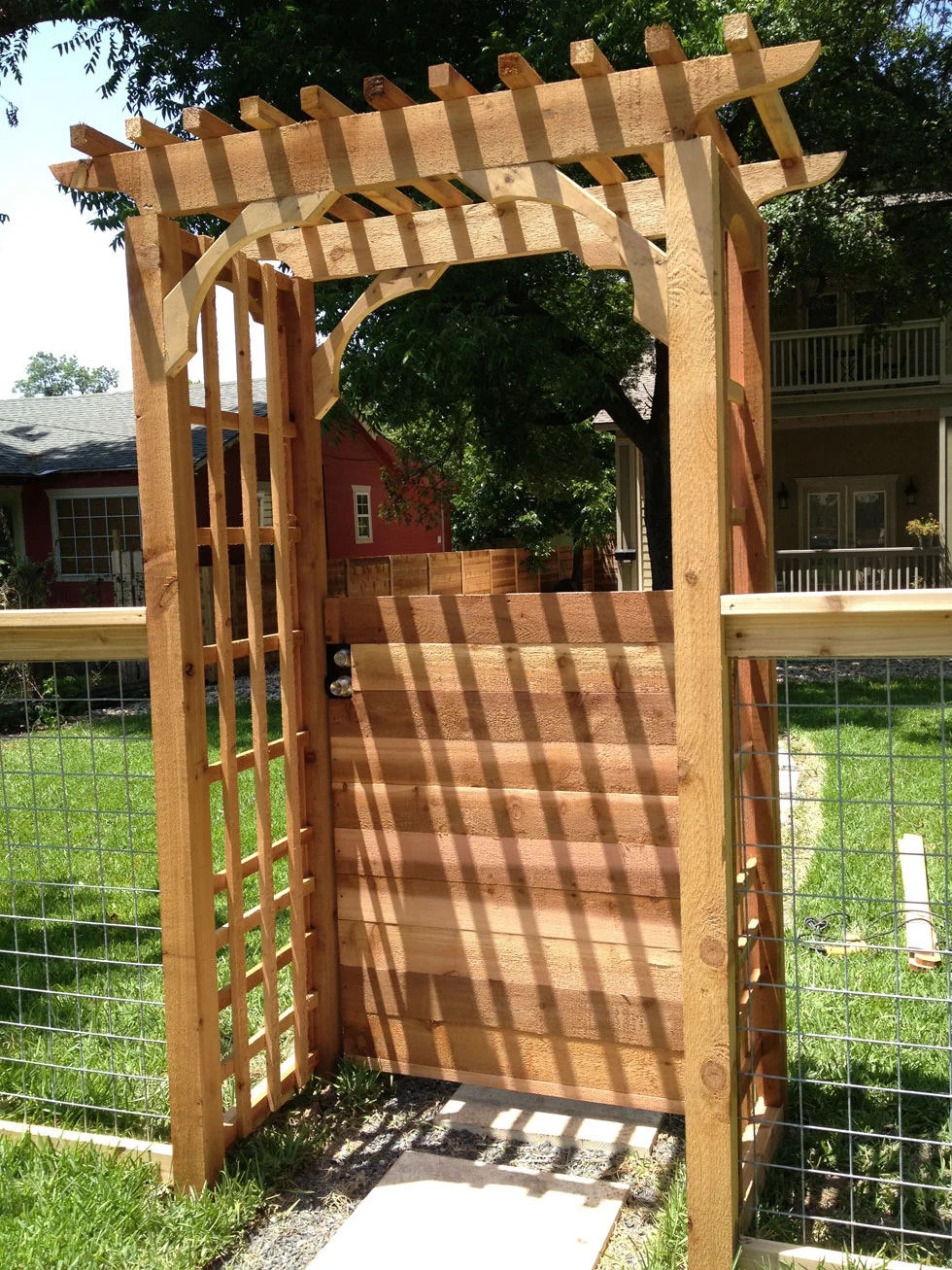 Gate and fence line completed by B.C. Fence on an Austin-area property