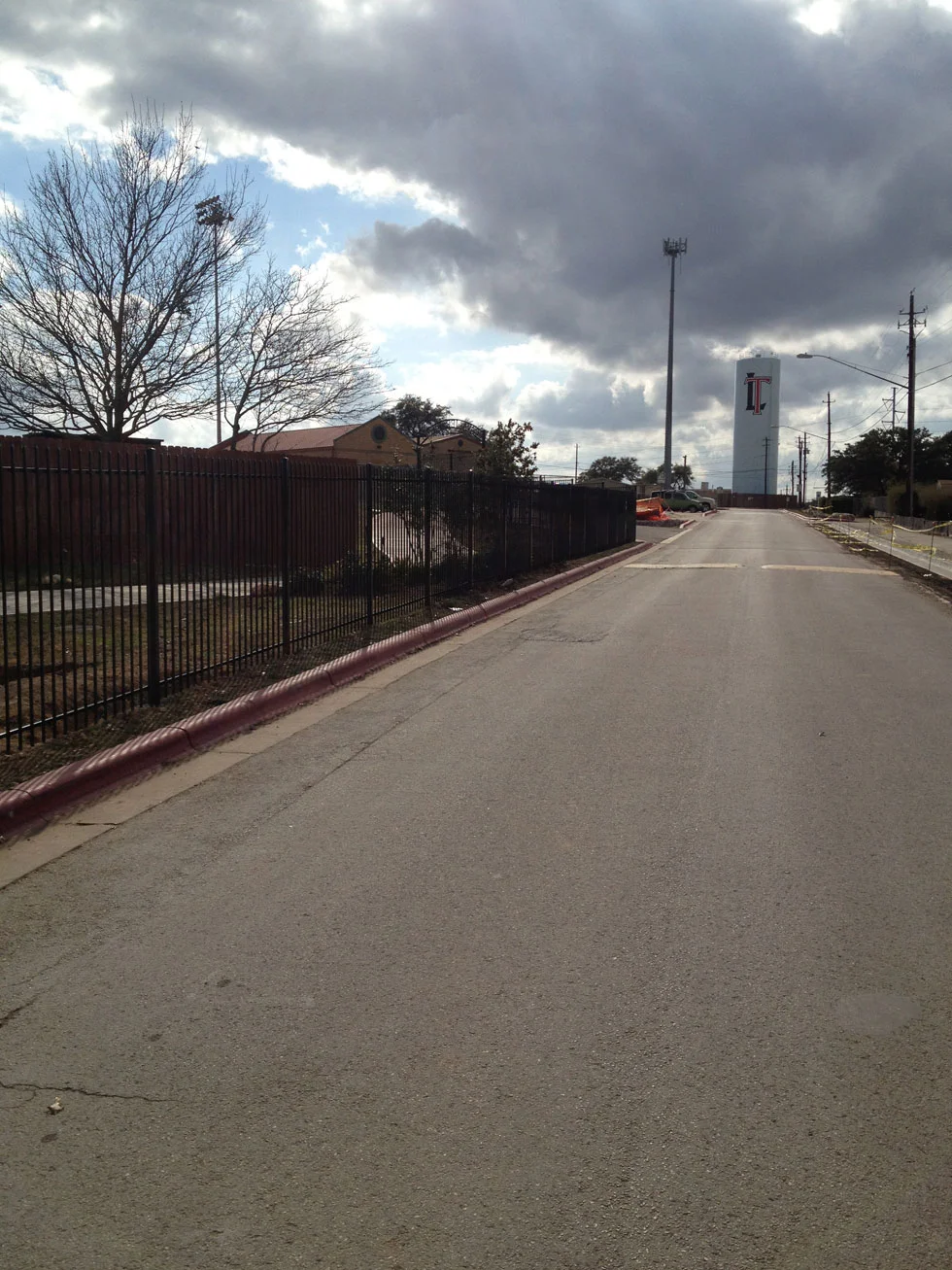 Ornamental iron fence built by B.C. Fence at a property in the Austin, TX area