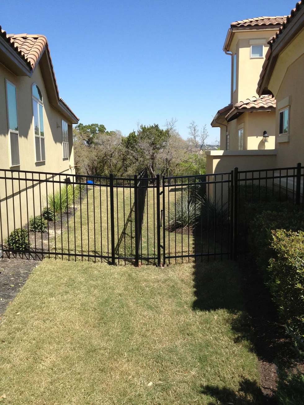 Ornamental iron fence installed by B.C. Fence in the Austin, TX area