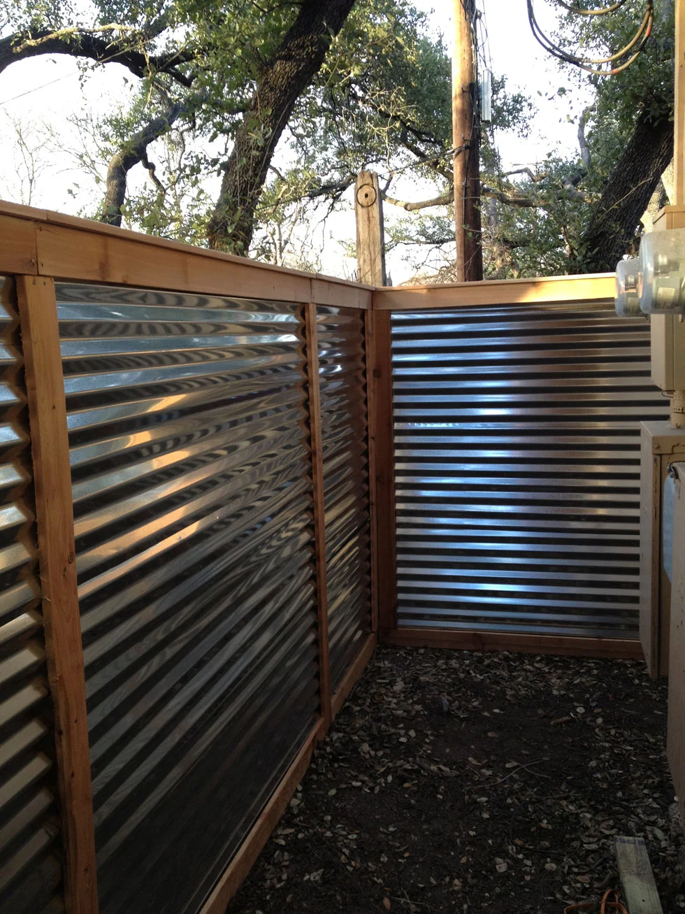 Completed residential fence line on an Austin-area property